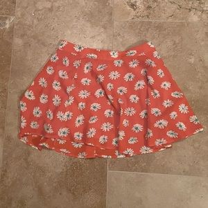 Orange skirt with daisies